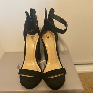 Never Worn Black High Heels with ankle slip in
